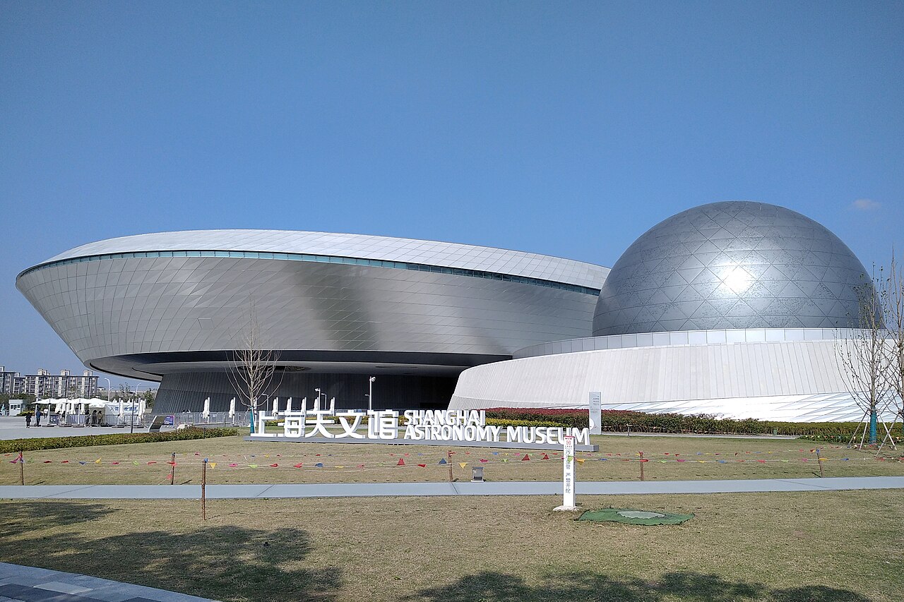 Shanghai Astronomy Museum: silver curved building and spherical dome in Lingang, Shanghai